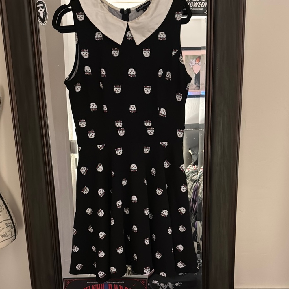 Smak Parlour Black Dress with White Collar and kitty head pattern.